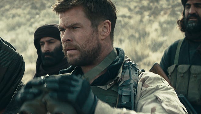Chris Hemsworth rides into '12 Strong' battle pondering Thor's future