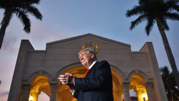 President Trump watches the Palm Beach Central High