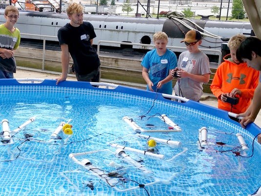 Students test their underwater robots during an underwater robotics summer camp at Manitowoc’s Wisconsin Maritime Museum.