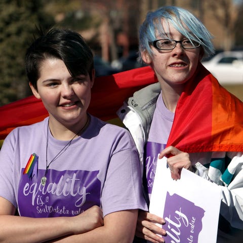 Nathan Leonard, left, a transgender high school st