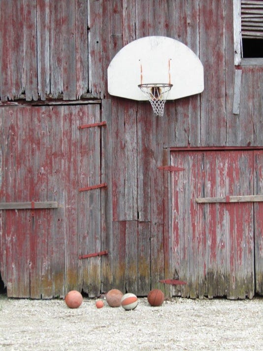 An old barn, a basketball rim, a father, two kids: An Indiana story.