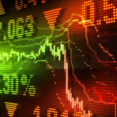 Stock market data and charts on a colorful display