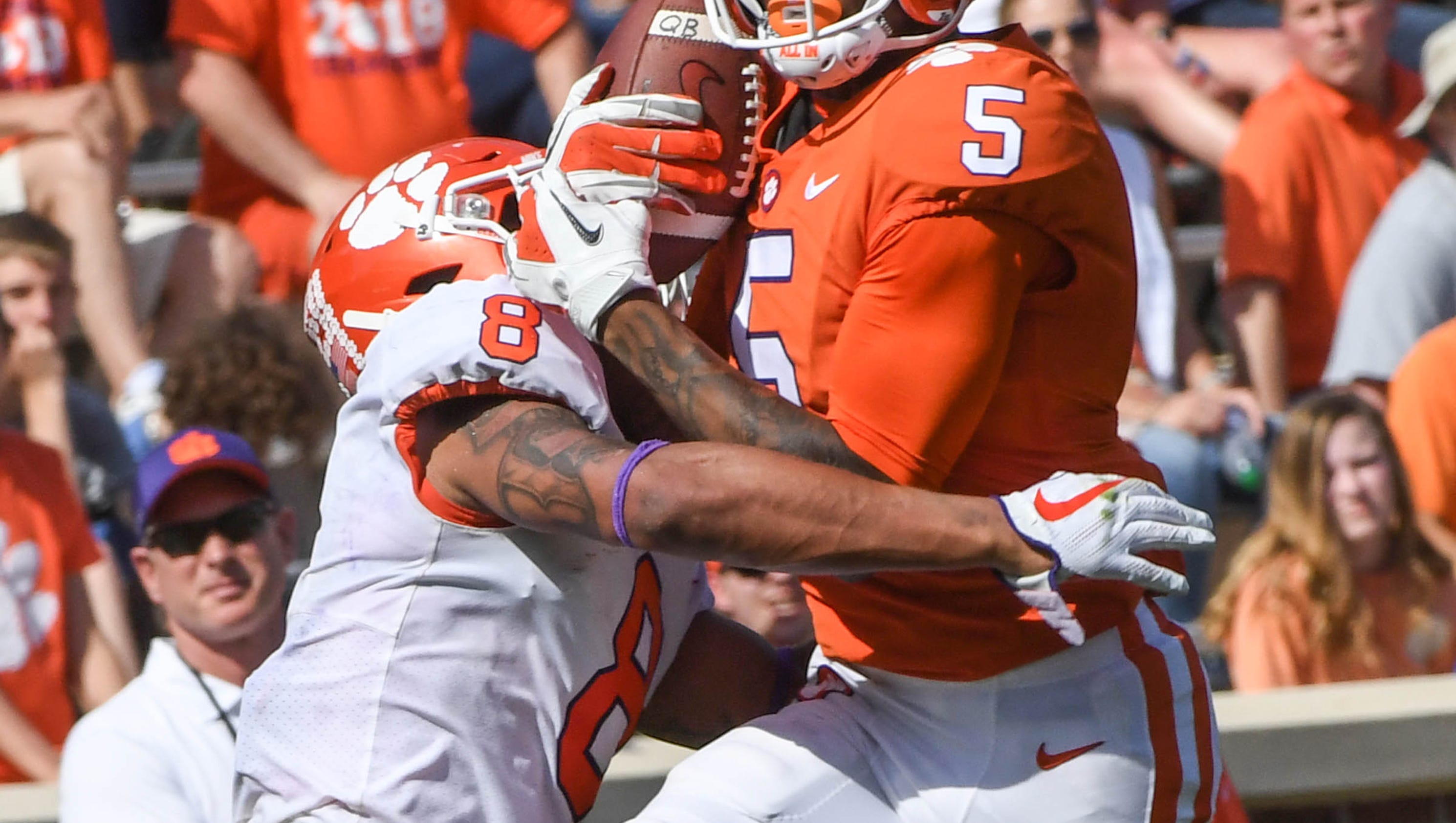 Photo of Clemson's Tee Higgins posing with sports car creates frenzy