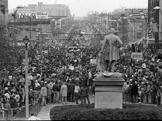 Thousands of fans line the streets to cheer on the MSU basketball team at the Parade of Champions, March 28, 1979.