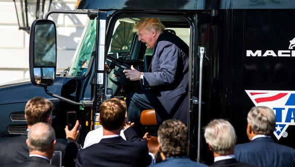 President Trump gets in the driver