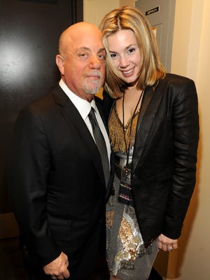 Billy Joel and girlfriend Alexis Roderick at the Barclays Center of ... photo