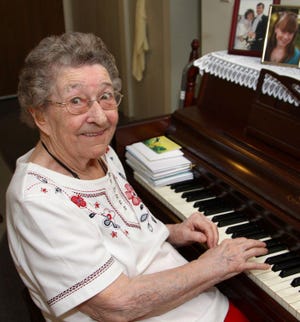 Mabel Pratt Bean, 92, in Weymouth in 2011. She played spirit-lifting songs on the piano, cheered people up on the phone and made new friends. File photo.