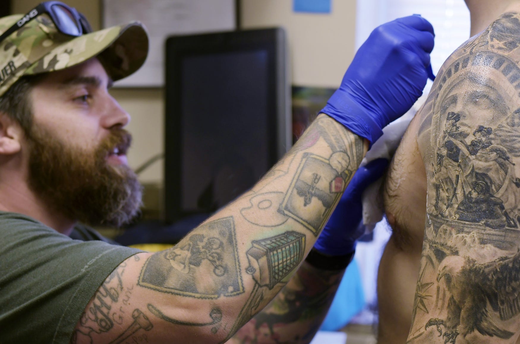 Military tattoos evolve into tributes for veterans