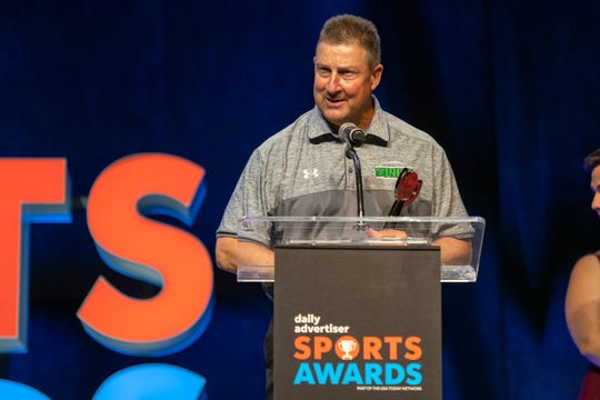 Eunice high school's head football coach Paul Trosclair receives the Courage Award as the Daily Advertiser hosts the annual Sports Awards Ceremony at the Cajundome on Wednesday, May 15, 2019.