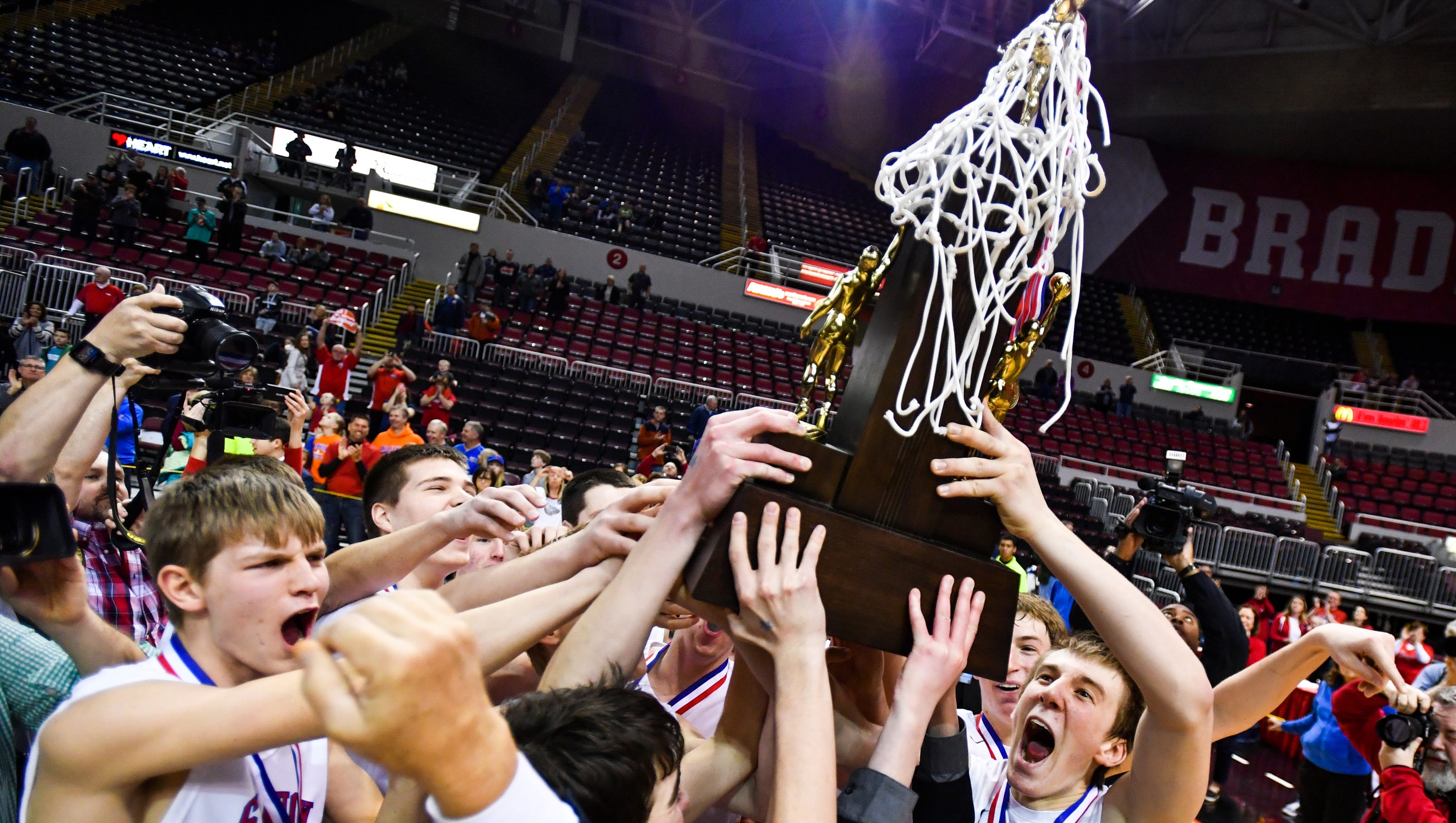 Eight champs, two weekends IHSA officially alters basketball state