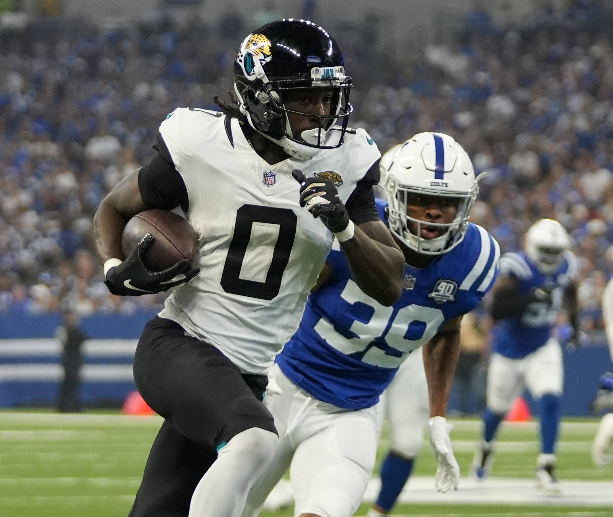 Houston, Texas, USA. Houston, Texas, USA. 1st Jan, 2023. Jacksonville  Jaguars running back JaMycal Hasty (22) carries the ball upfield during the  third quarter of the game between the Houston Texans and