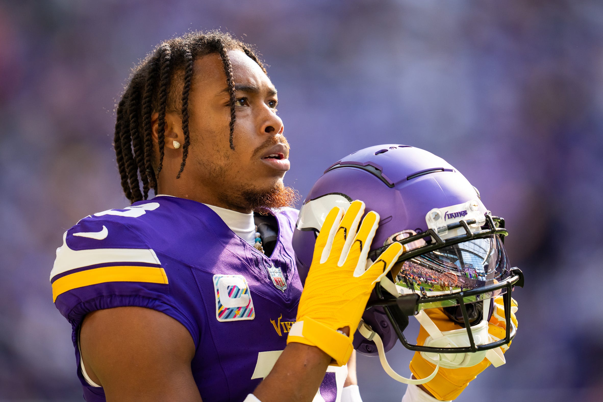 Arizona Cardinals wide receiver Davion Davis (10) runs down the field  during the first half of an NFL preseason football game against the  Minnesota Vikings, Saturday, Aug. 26, 2023, in Minneapolis. (AP