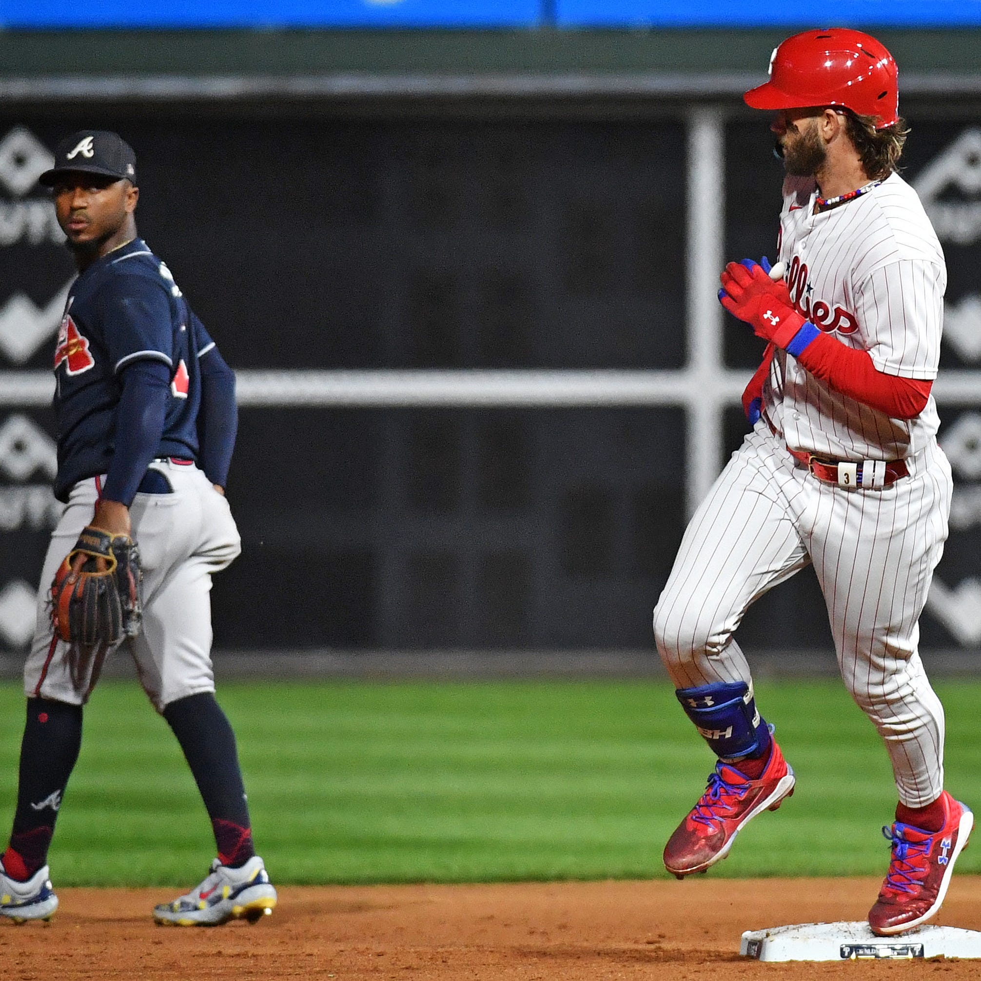 Braves score twice on Suzuki's fielding error, overcome 6-run