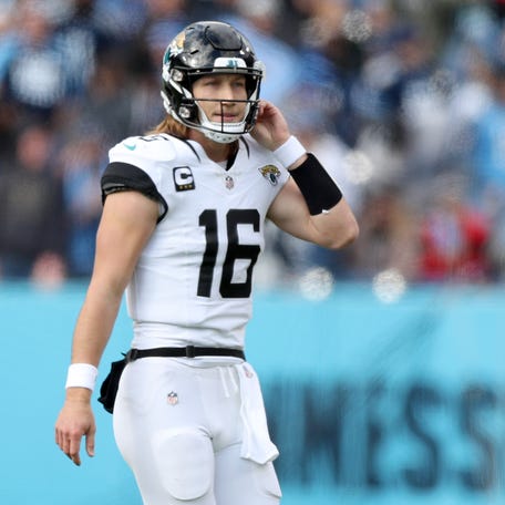 Trevor Lawrence #16 of the Jacksonville Jaguars reacts during the first half against the Tennessee Titans at Nissan Stadium on January 07, 2024 in Nashville, Tennessee.
