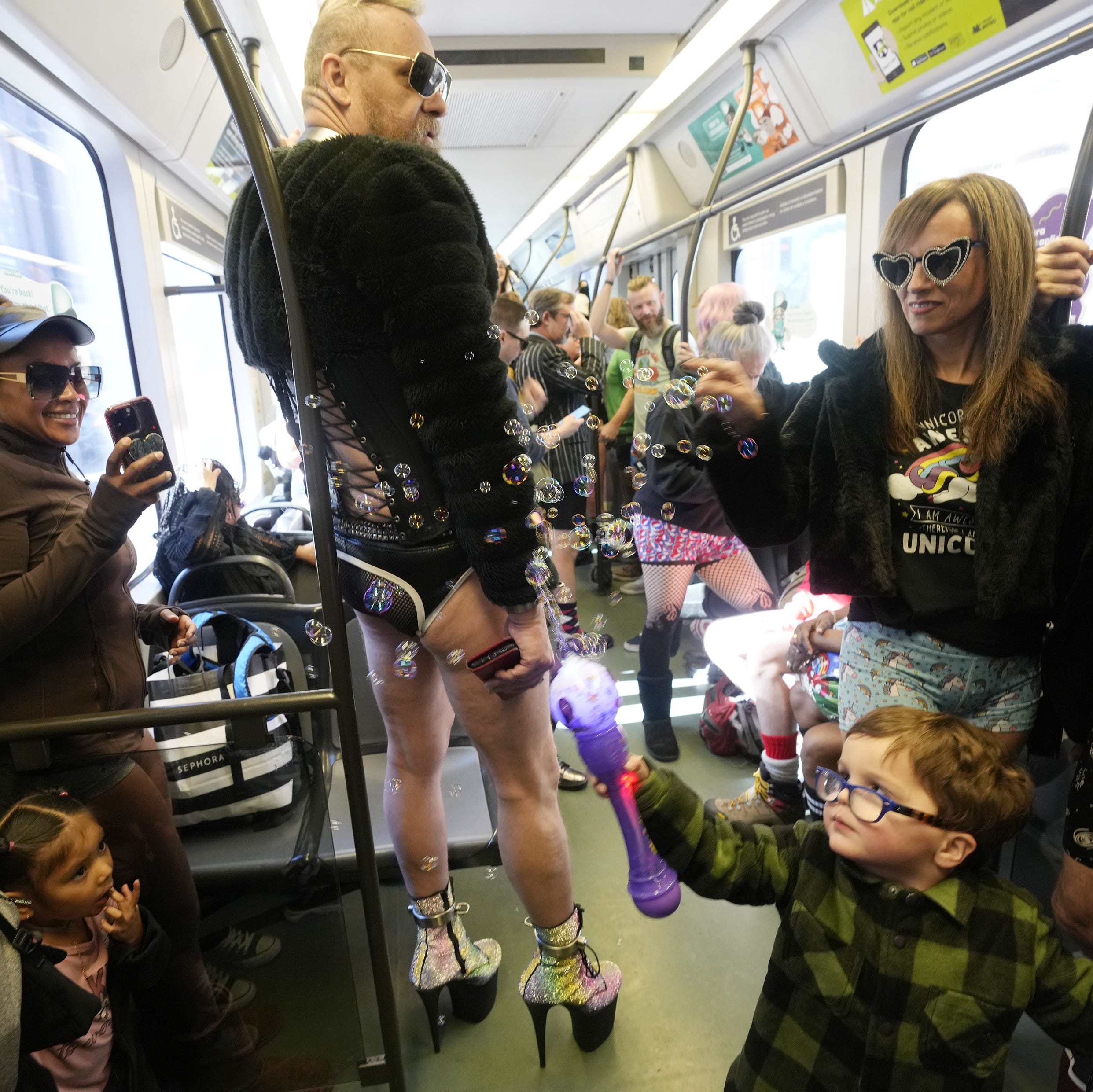 No Pants Light Rail Day: Valley Metro riders crowd tram