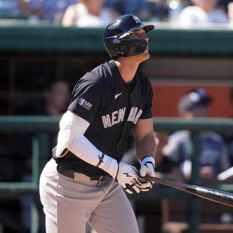 New York Yankees outfielder Spencer Jones watches his fifth inning home run during a spring training baseball game against the Detroit Tigers Saturday, Feb. 24, 2024, in Lakeland, Fla. (AP Photo/Charlie Neibergall)