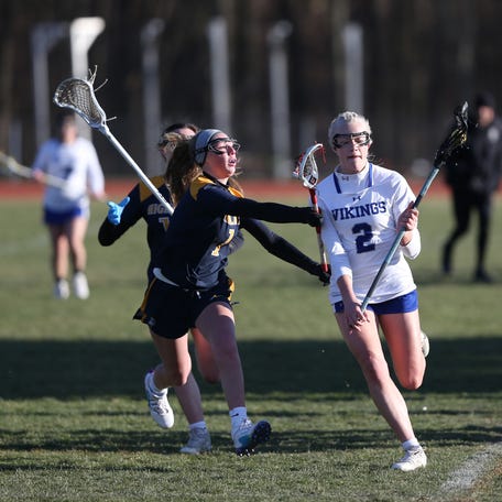 Rebecca Sibley (2) of Valley Central dashes past a defender. Action from Thursday's girls lacrosse home opener between Highland and Valley Central on March 21 2024.