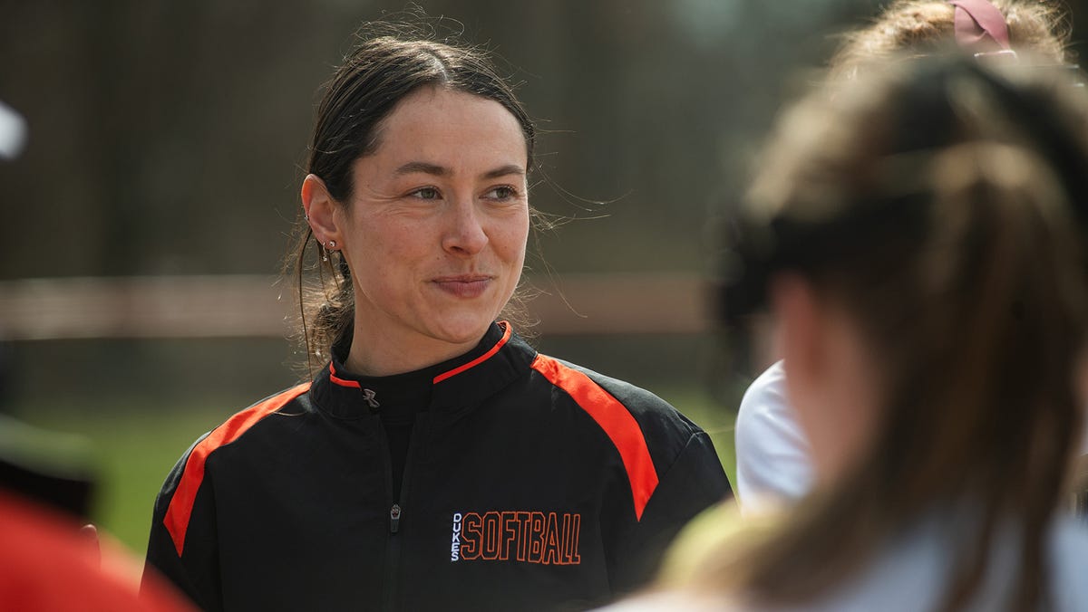 Marlboro head coach Andrea Schoonmaker talks to her softball team before the first inning of a March 26, 2024 home game against Warwick.