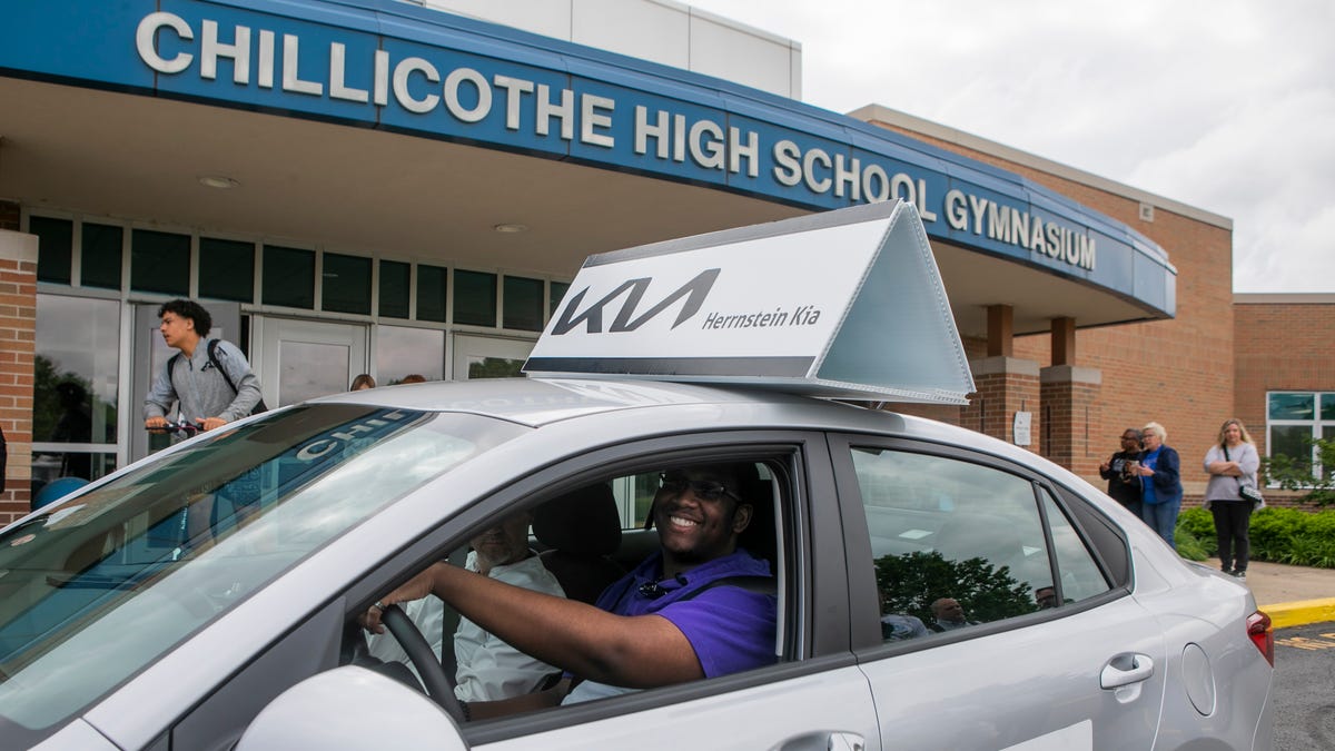 Junior Solomon Dixon, 16, smiles as he drives off in his 2023 Kia Rio after his name was called out and it was announced that he was the winner of the car, supplied by Hernstein Kia dealership, during the Keys to Success drawing and prize giveaway at Chillicothe High School on May 10, 2024, in Chillicothe, Ohio. The program celebrates students being drug free.