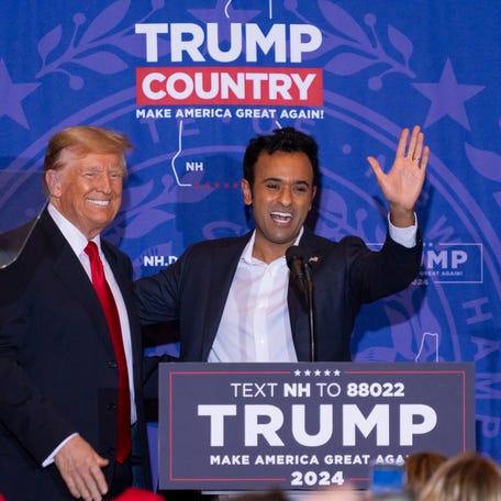 Former President Donald Trump and Vivek Ramaswamy address the crowd at a Trump campaign rally at Atkinson Country Club and Resort in Atkinson, N.H., on Jan. 16, 2024, a day after Ramaswamy ended his presidential bid and endorsed Trump.