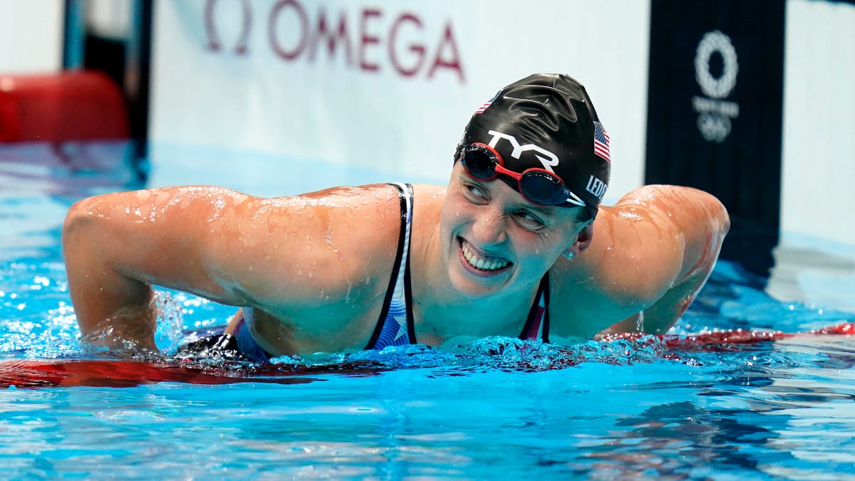 Jul 31, 2021; Tokyo, Japan; Katie Ledecky (USA) reacts after winning the women's 800m freestyle final during the Tokyo 2020 Olympic Summer Games at Tokyo Aquatics Centre.