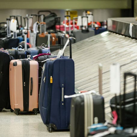 The luggage of Southwest Airlines passengers waits to be claimed in the baggage claim area at Chicago Midway International Airport in Chicago, Illinois, on December 28, 2022.