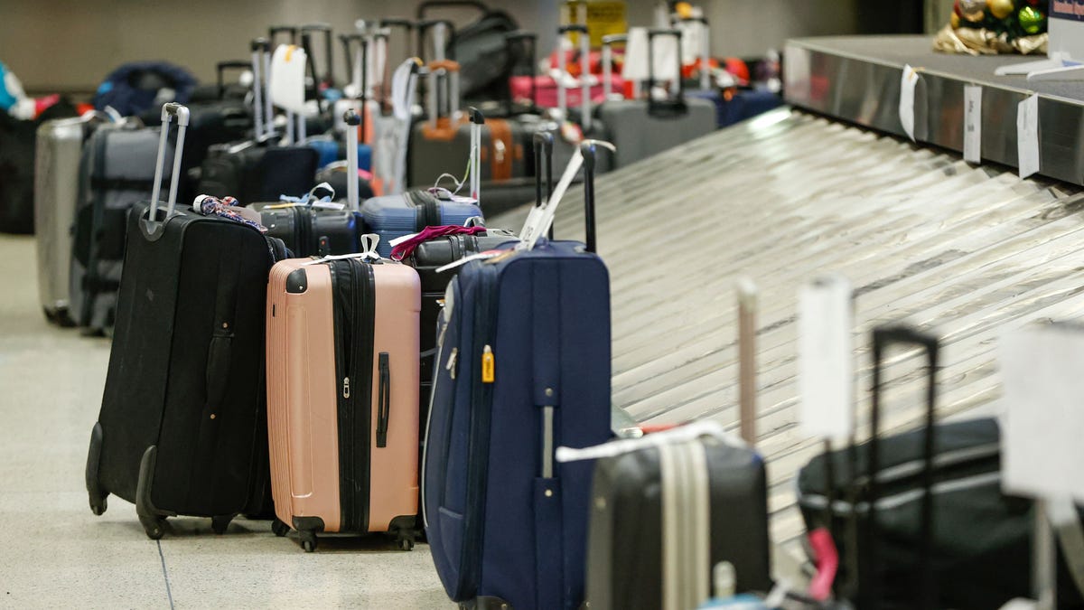 The luggage of Southwest Airlines passengers waits to be claimed in the baggage claim area at Chicago Midway International Airport in Chicago, Illinois, on December 28, 2022.