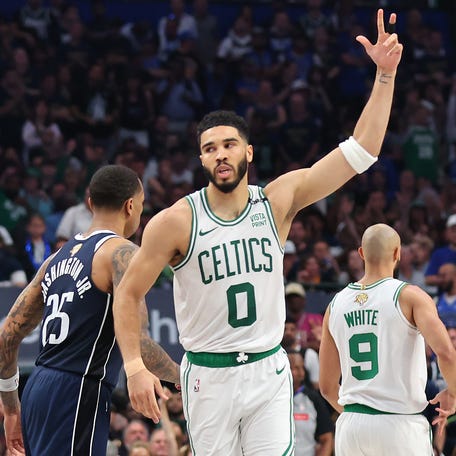 DALLAS, TEXAS - JUNE 12: Jayson Tatum #0 of the Boston Celtics celebrates after making a shot in the second quarter against the Dallas Mavericks in Game Three of the 2024 NBA Finals at American Airlines Center on June 12, 2024 in Dallas, Texas.