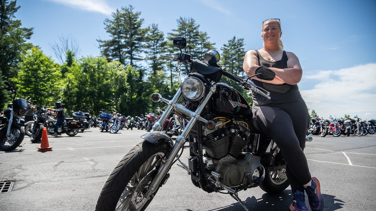 Cheyenne Wright with her bike during the 101st Laconia Motorcycle Week in Laconia, New Hampshire, on June 13, 2024.