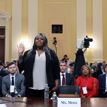 Former Georgia election worker Wandrea ArShaye Moss is sworn in during the fourth hearing by the House Select Committee to Investigate the January 6th Attack on the US Capitol in the Cannon House Office Building in Washington, DC, on June 21, 2022. (Photo by MICHAEL REYNOLDS / POOL / AFP) (Photo by MICHAEL REYNOLDS/POOL/AFP via Getty Images)