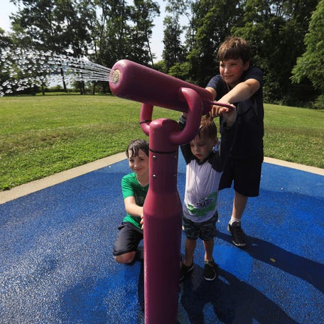 From left, Caleb Ryan, Silas Jordan and James Ryan man the water canon at the Splash Pad at Bowdoin Park in Wappingers Falls on June 17, 2024.