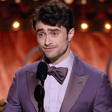 Daniel Radcliffe accepts the Best Performance by an Actor in a Featured Role in a Musical award for "Merrily We Roll Along" June 16 during the 77th Annual Tony Awards at David H. Koch Theater at Lincoln Center in New York.