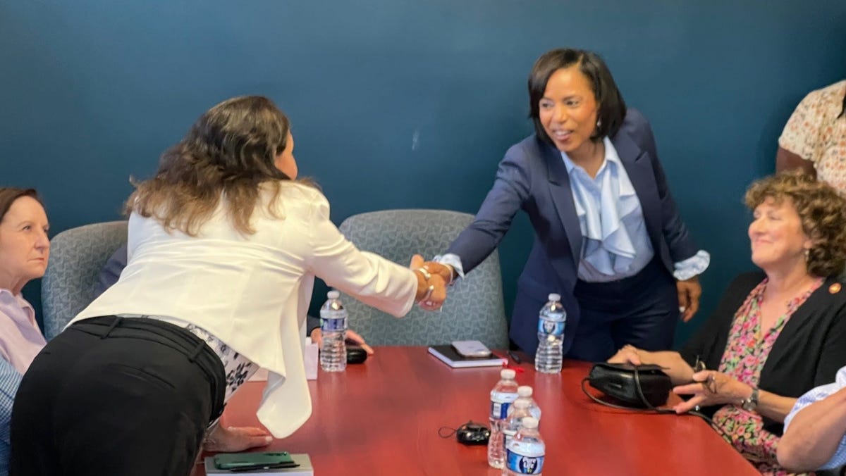 Prince Georgeâ€™s County Executive Angela Alsobrooks, a Democratic candidate for United States Senate, shakes hands with a participant in a roundtable discussion with Jewish community leaders in Pikesville, Maryland on June 17, 2024.
