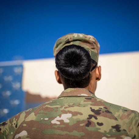 Seen is the hair bun of MSG Janina Simmons, U.S. Army Ranger, as she stands near Fort Bliss Military Installation, in El Paso, Texas, Thursday, February 24, 2022. Simmons made history as the first black female soldier to pass U.S. Army Ranger School.    First Black Female Soldier To Pass U S Army Ranger School
