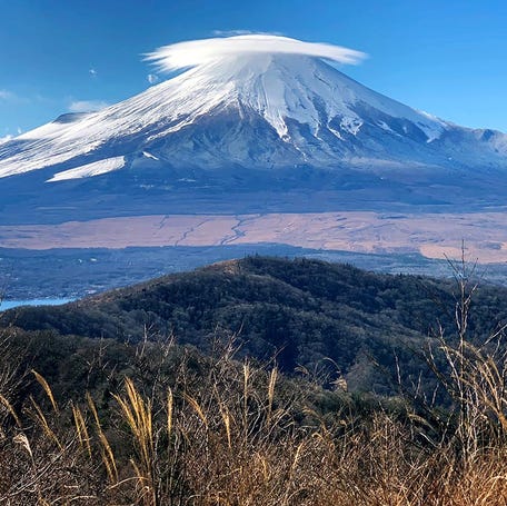 This picture taken on December 9, 2021 shows Mount Fuji pictured from Mount Ishiwari near Oshino, Yamanashi prefecture.