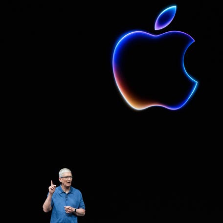 Apple CEO Tim Cook speaks during Apple's annual Worldwide Developers Conference (WDC) in Cupertino, California on June 10, 2024. (Photo by Nic Coury / AFP) (Photo by NIC COURY/AFP via Getty Images)