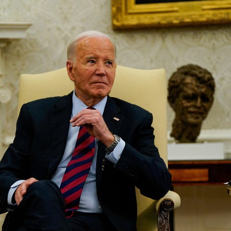 FILE PHOTO: U.S. President Joe Biden reacts to questions from reporters during a meeting with NATO Secretary General Jens Stoltenberg in the Oval Office at the White House in Washington, U.S., June 17, 2024. REUTERS/Elizabeth Frantz/File Photo