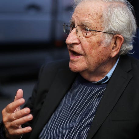 US linguist and political activist Noam Chomsky (R), talks during a press conference after visiting former President Luiz Inacio Lula da Silva, arrested for corruption in the Federal Police Superintendence in Curitiba, Brazil on September 20, 2018. (Photo by Heuler Andrey / AFP) (Photo by HEULER ANDREY/AFP via Getty Images)