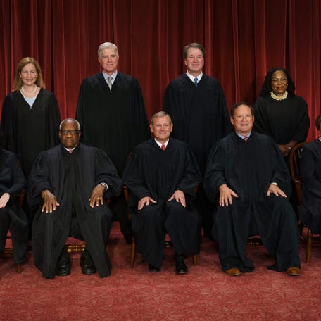 From left, Justices Sonia Sotomayor, Amy Coney Barrett, Clarence Thomas and Neil Gorsuch, Chief Justice John Roberts, and Justices Brett Kavanaugh, Samuel Alito, Ketanji Brown Jackson and Elena Kagan.