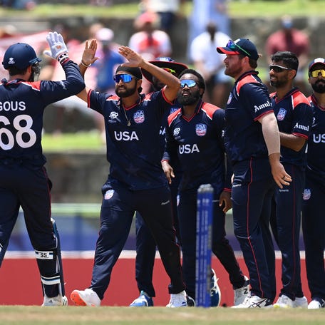 Saurabh Netravalkar of USA celebrates taking the wicket of Aiden Markram of South Africa during the ICC Men's T20 Cricket World Cup West Indies & USA 2024 Super Eight match between USA and South Africa at Sir Vivian Richards Stadium on June 19, 2024 in Antigua.