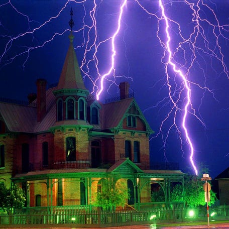 Lightning strikes behind the historic Rosson House in downtown Phoenix.