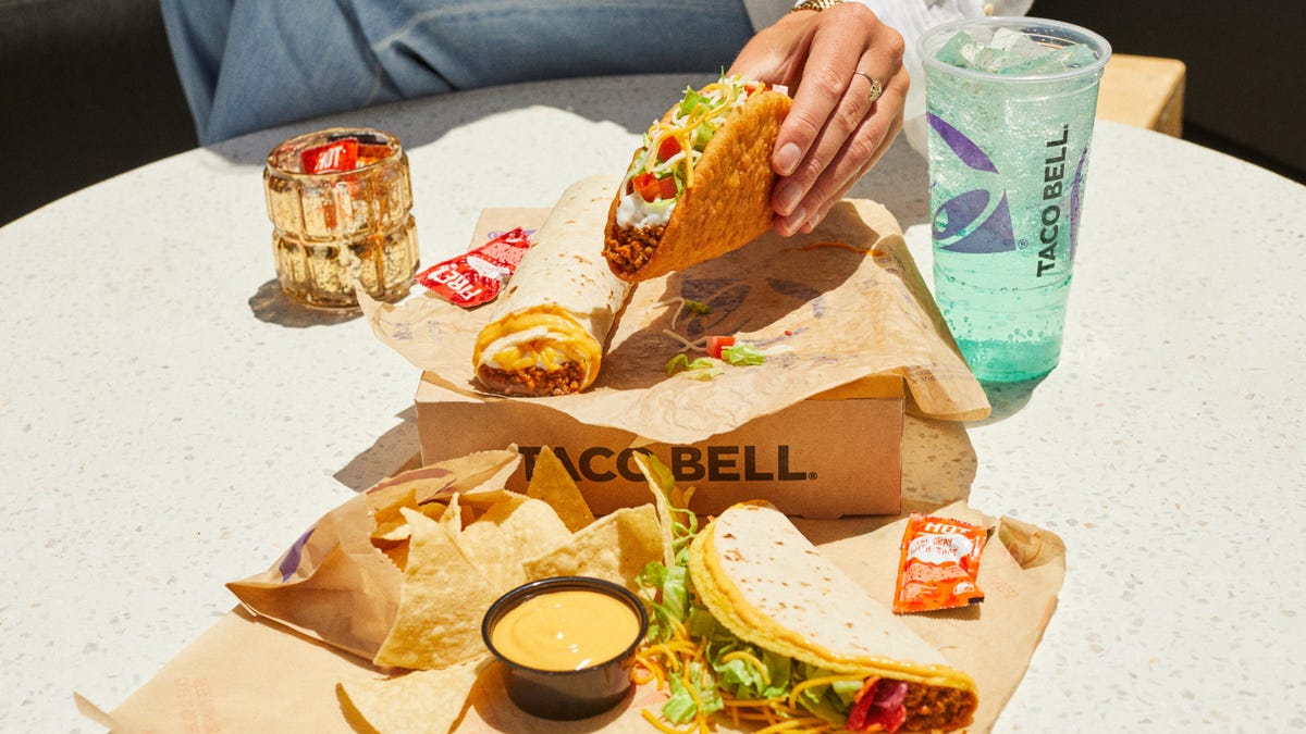 Taco Bell's new $7 limited-time Luxe Cravings Box comes with a Chalupa Supreme, Beefy 5-Layer Burrito, Double Stacked Taco, chips and nacho cheese sauce, and a medium drink.