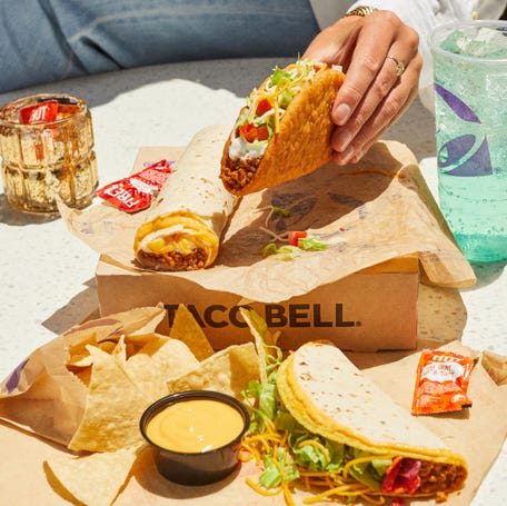 Taco Bell's new $7 limited-time Luxe Cravings Box comes with a Chalupa Supreme, Beefy 5-Layer Burrito, Double Stacked Taco, chips and nacho cheese sauce, and a medium drink.