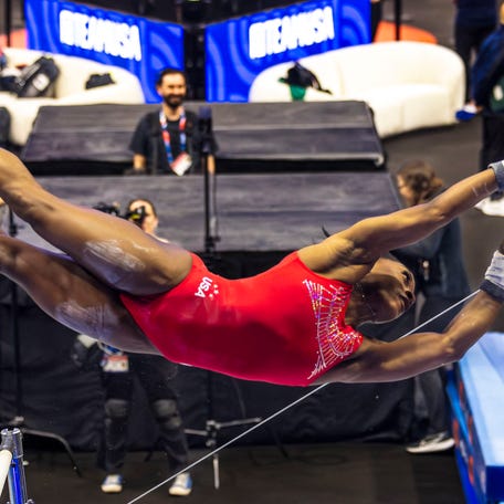 Gymnast Simone Biles trains on the uneven bars ahead of the 2024 US Olympic Gymnastics Trials at the Target Center in Minneapolis, Minnesota on June 26, 2024. (Photo by Kerem YUCEL / AFP) (Photo by KEREM YUCEL/AFP via Getty Images)