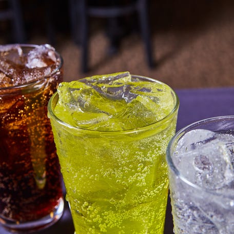 Image of 3 soft drinks.