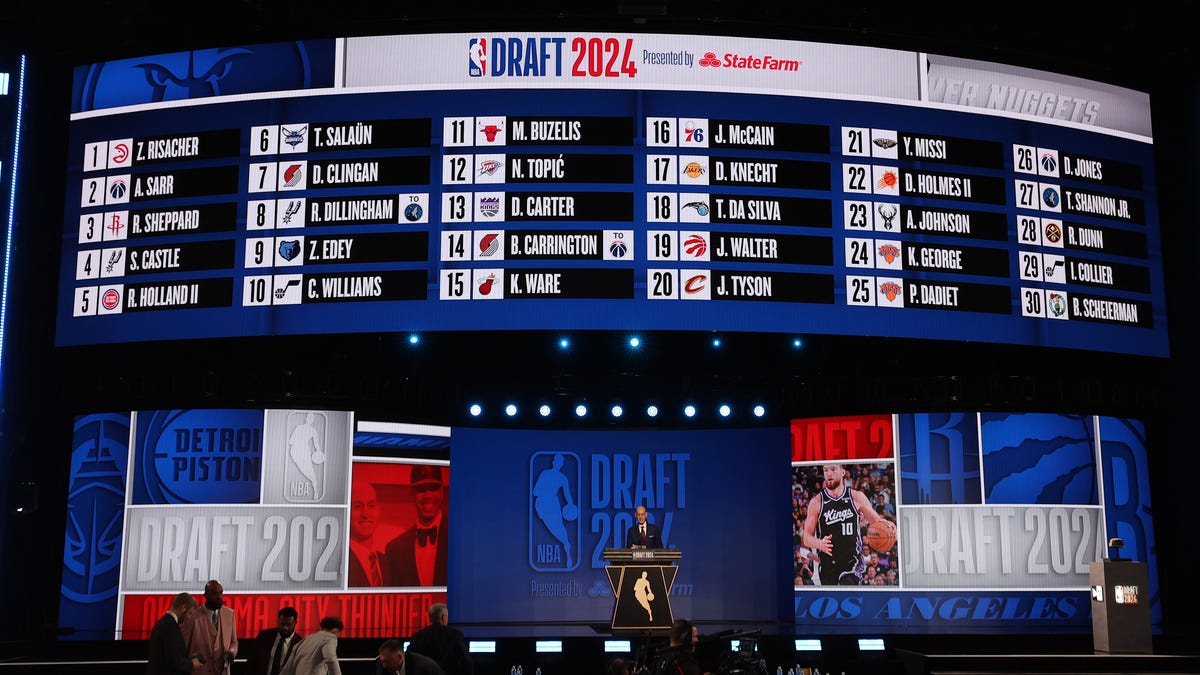 NBA commissioner Adam Silver speaks at the podium after the first round of the 2024 NBA draft at Barclays Center.
