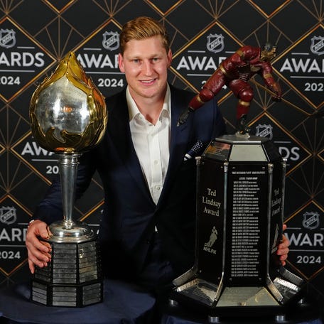 Colorado Avalanche superstar Nathan MacKinnon was awarded the Hart Trophy and the Ted Lindsay Award on Thursday night. Award winners and point totals.