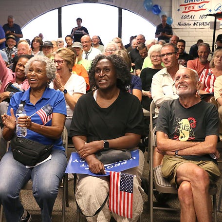 People react to something that President Biden said during the presidential debate at the Washoe County Democratic Party headquarters in Reno on June 27, 2024.