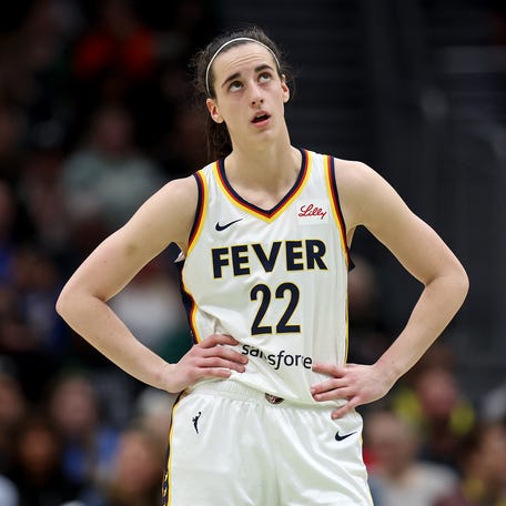 Caitlin Clark reacts during the fourth quarter of the Indiana Fever's loss against the Seattle Storm.