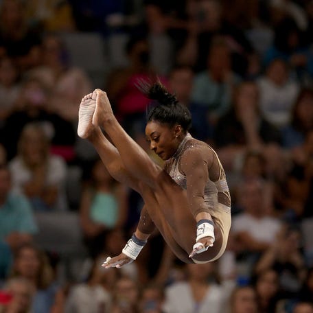 FORT WORTH, TEXAS - JUNE 02: Simone Biles competes on the uneven bars during the 2024 Xfinity U.S. Gymnastics Championships at Dickies Arena on June 02, 2024 in Fort Worth, Texas. (Photo by Elsa/Getty Images)